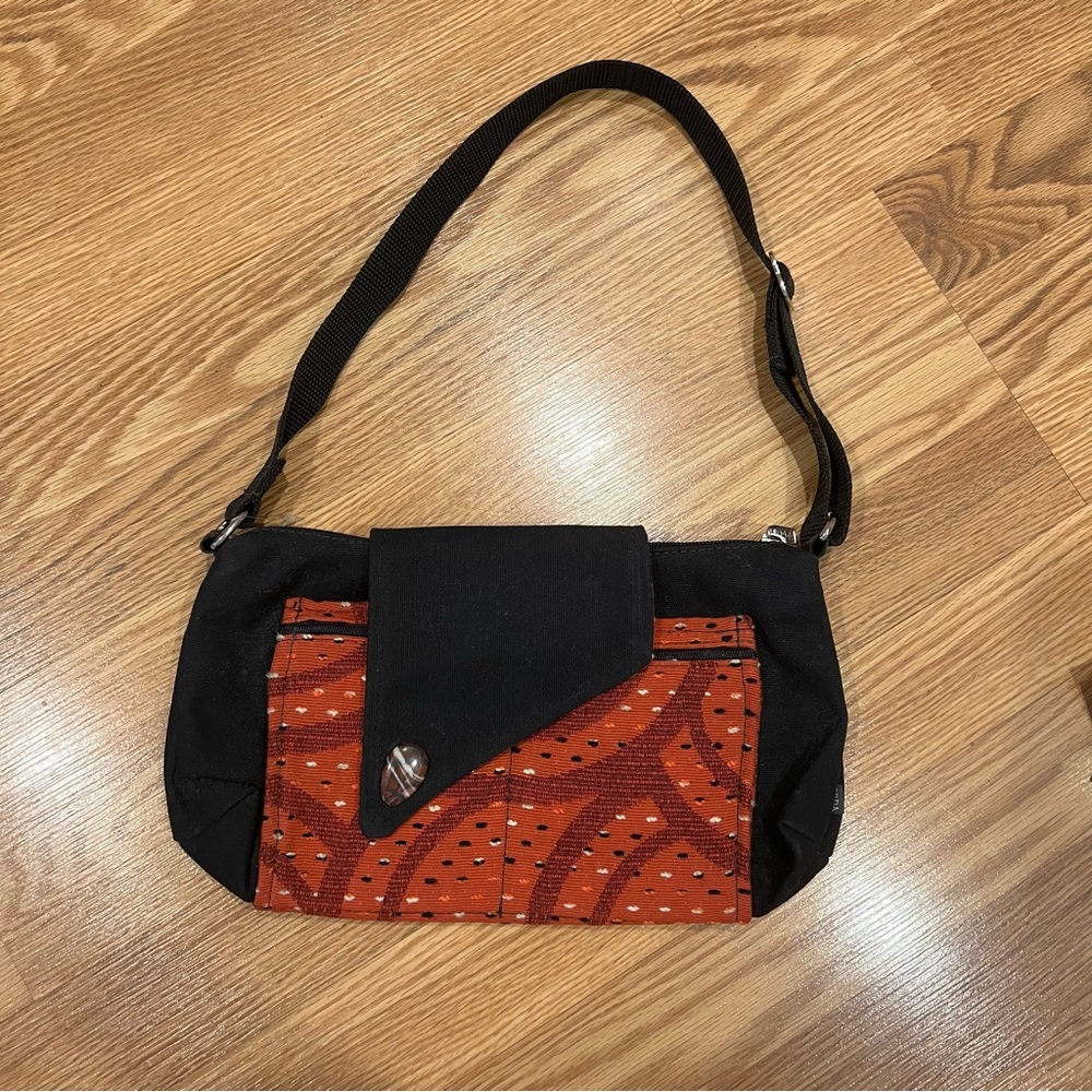 Erda asymmetrical canvas shoulder bag Black‎ reddish / orange